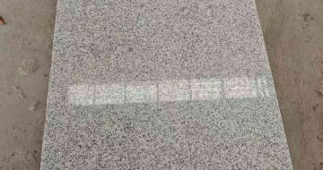 六安芝麻白光面毛板