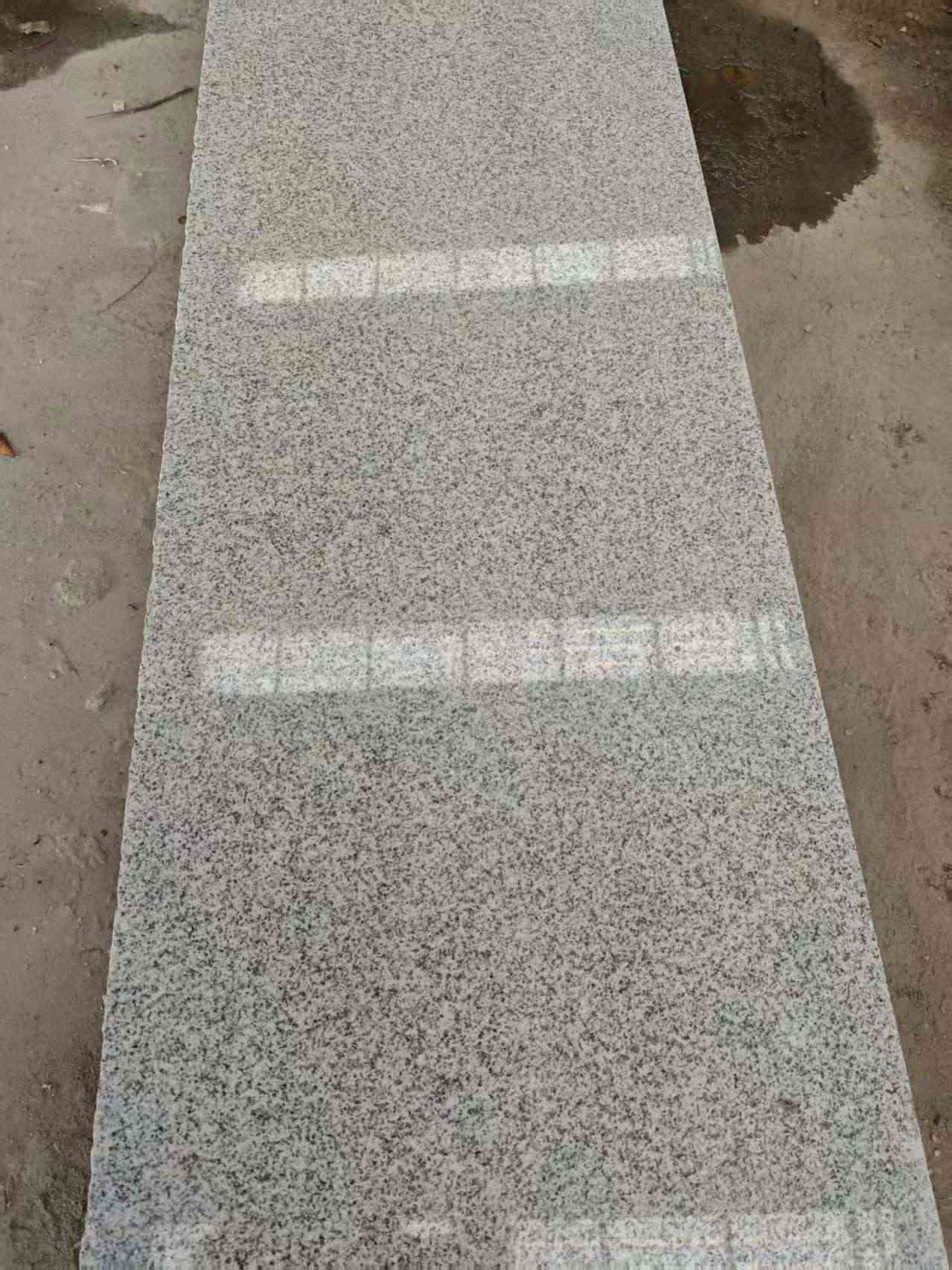 六安芝麻白光面毛板